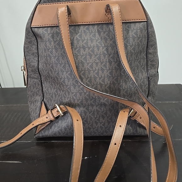 Michael Kors Valerie medium logo backpack in brown and acorn PVC and leather.  - Picture 12 of 13